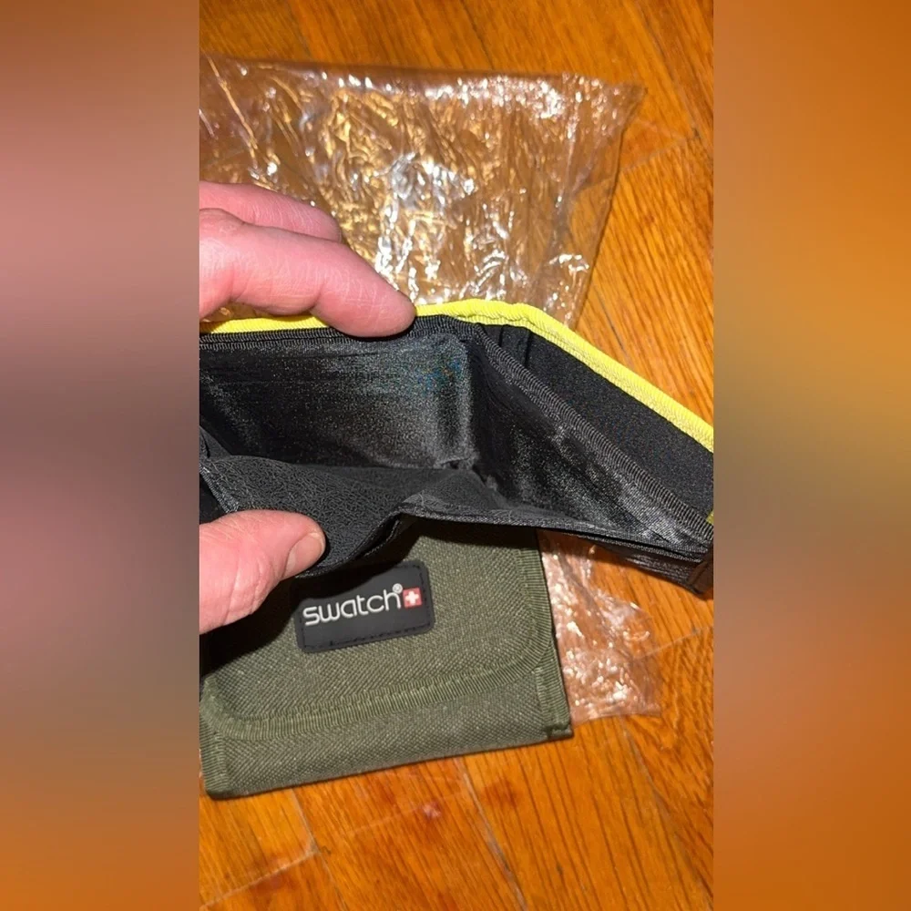 NWT Swatch brand wallet/billfold coin purse available in green or yellow unisex